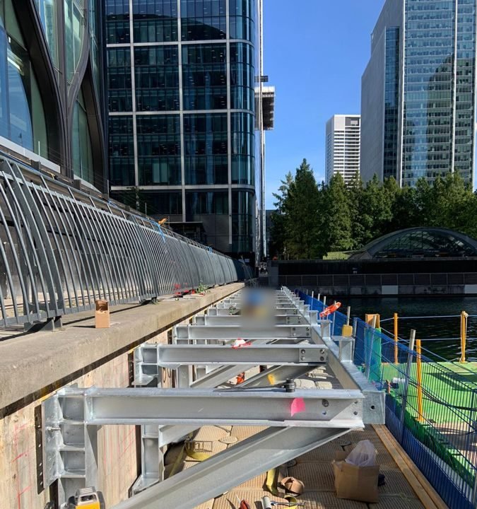 Brackets installed along the dock edge