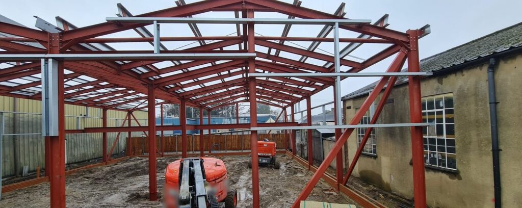 The roof frame going up